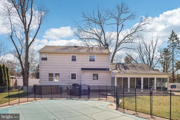 a picture of a cabinet with a floor in a white refrigerator