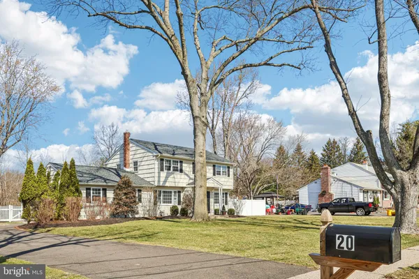 a view of a trees in front of a building