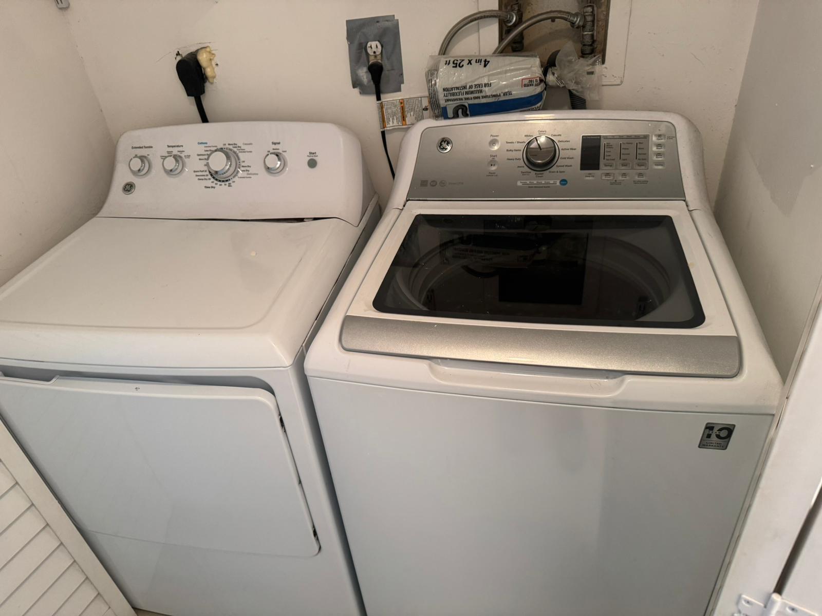 4702 Waterview Circle Palm Springs, FL 33461 - Photo 16 of 22 a utility room with dryer and washer