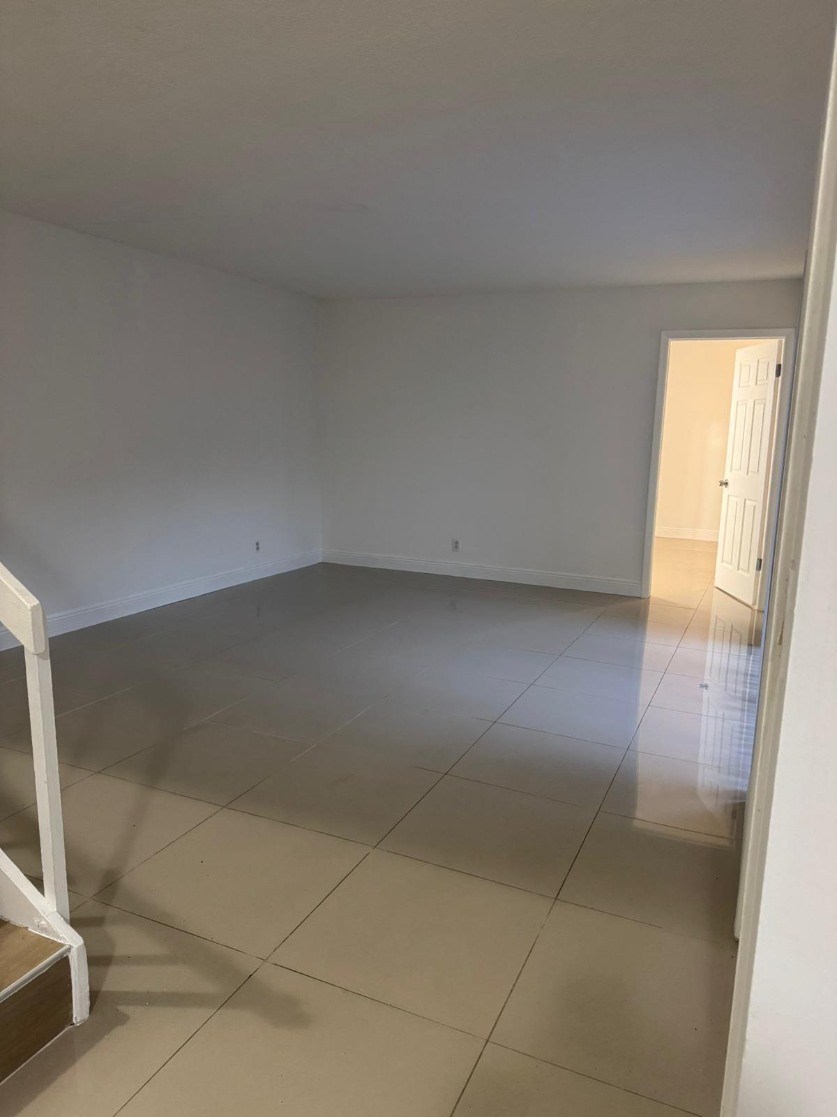 4702 Waterview Circle Palm Springs, FL 33461 - Photo 19 of 22 a view of a room with an empty space