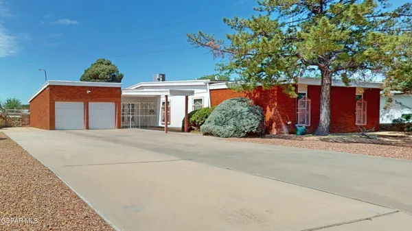 front view of a house with a street