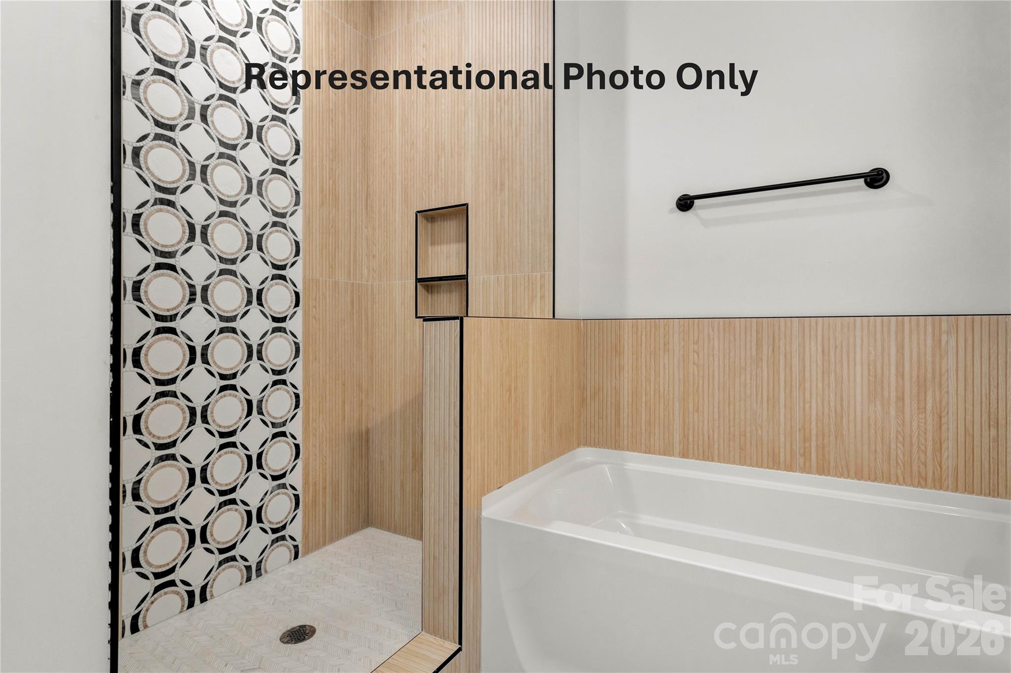 265 Bob Friday Road Dallas, NC 28034 - Photo 13 of 13 a bathroom with a bathtub and shower