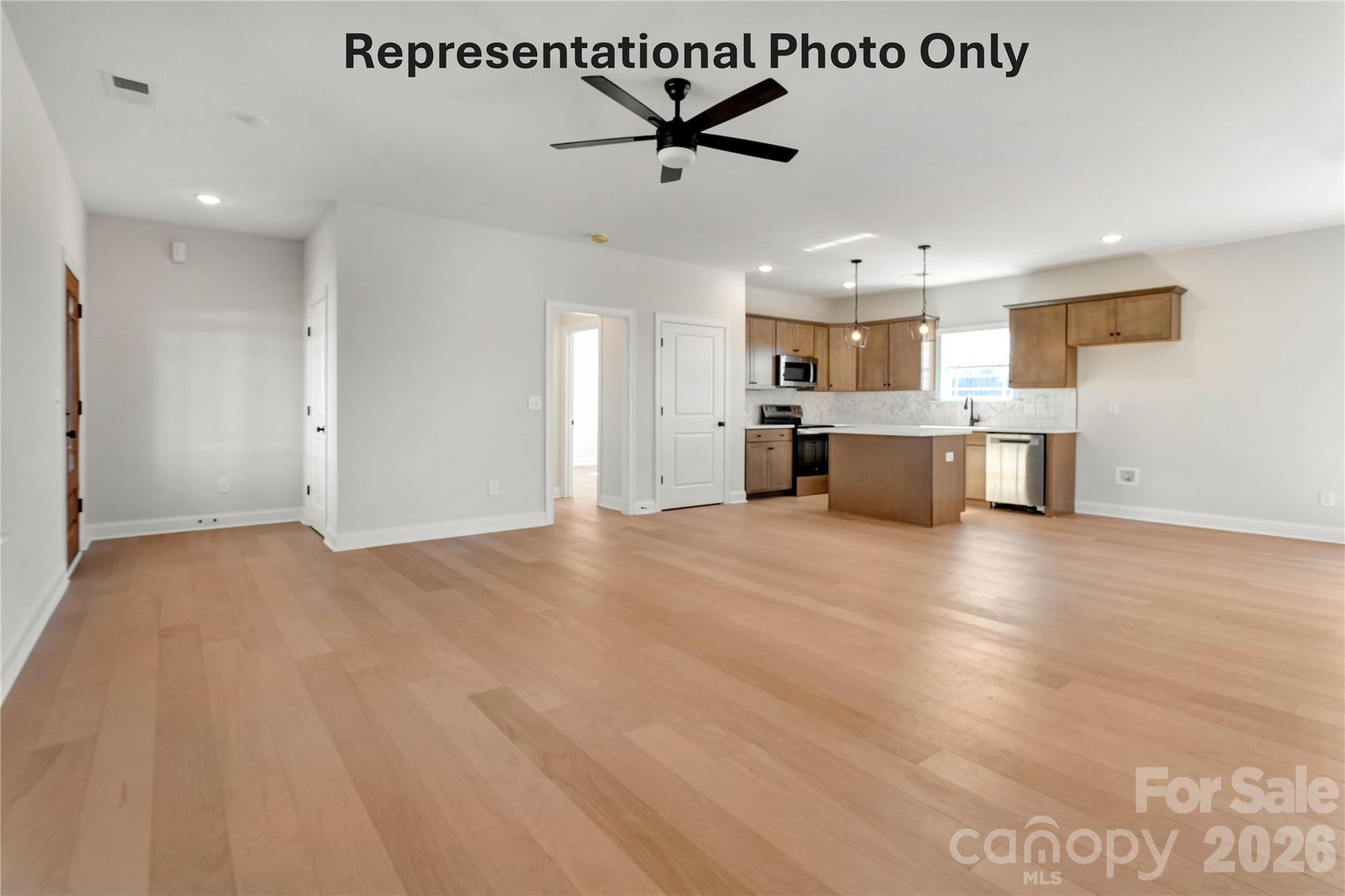 265 Bob Friday Road Dallas, NC 28034 - Photo 9 of 13 a view of kitchen with a sink and a refrigerator
