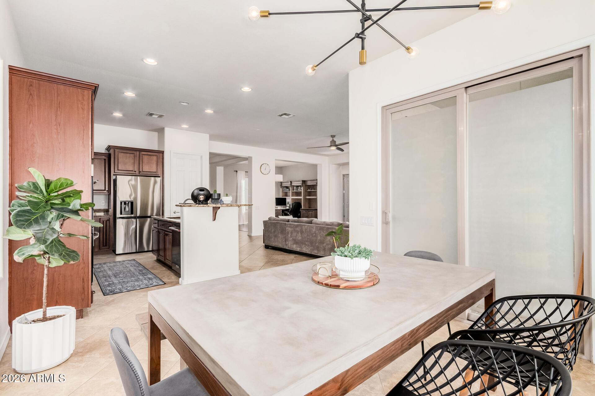 5606 West Desperado Way Phoenix, AZ 85083 - Photo 11 of 43 a kitchen with a table and chairs