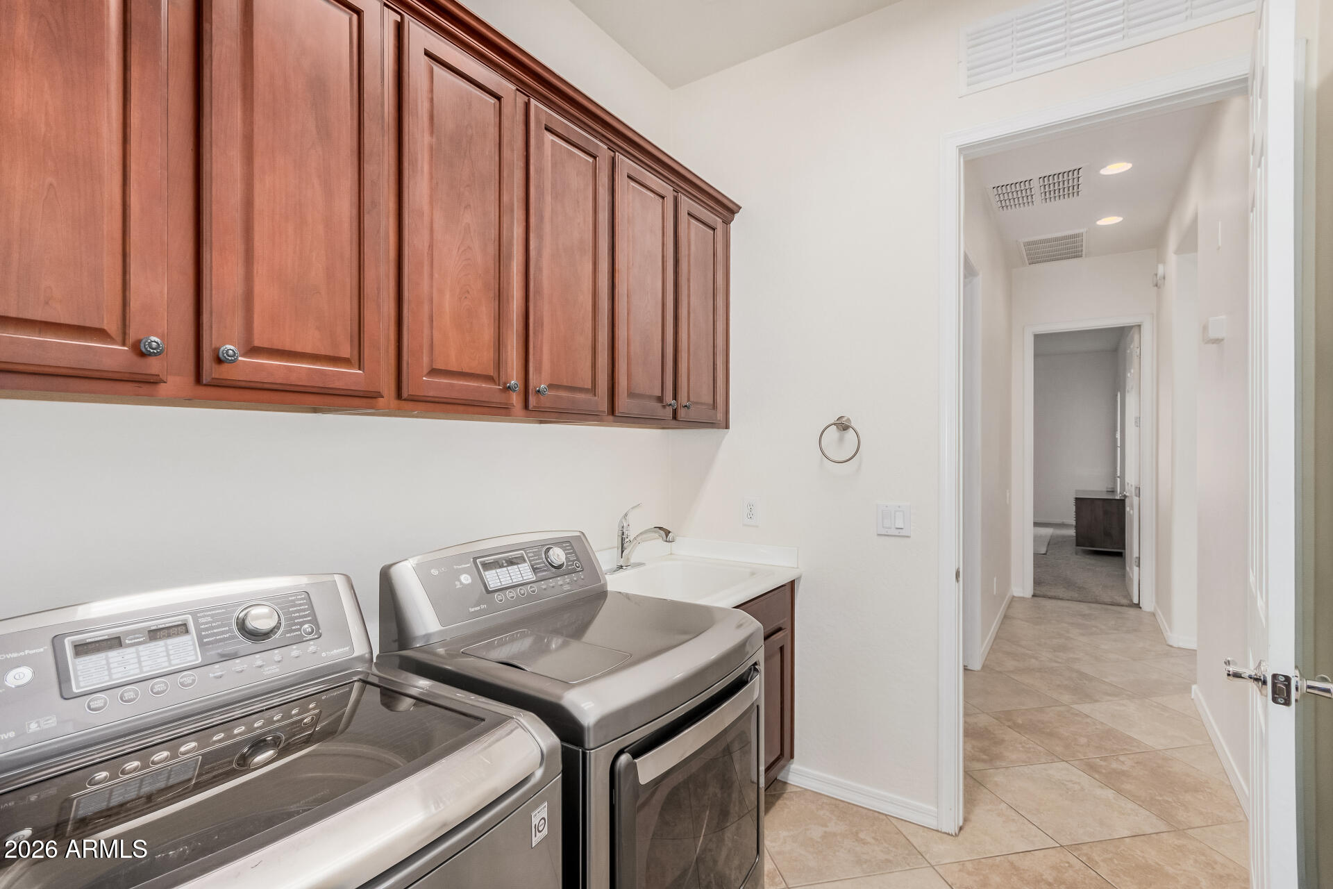 5606 West Desperado Way Phoenix, AZ 85083 - Photo 34 of 43 a utility room with dryer and washer