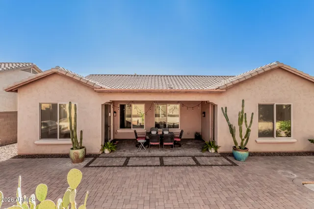 a front view of house with yard nad seating space