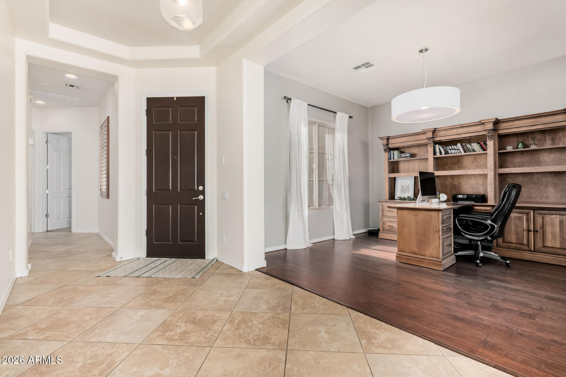 5606 West Desperado Way Phoenix, AZ 85083 - Photo 6 of 43 a view of work space with wooden floor and furniture