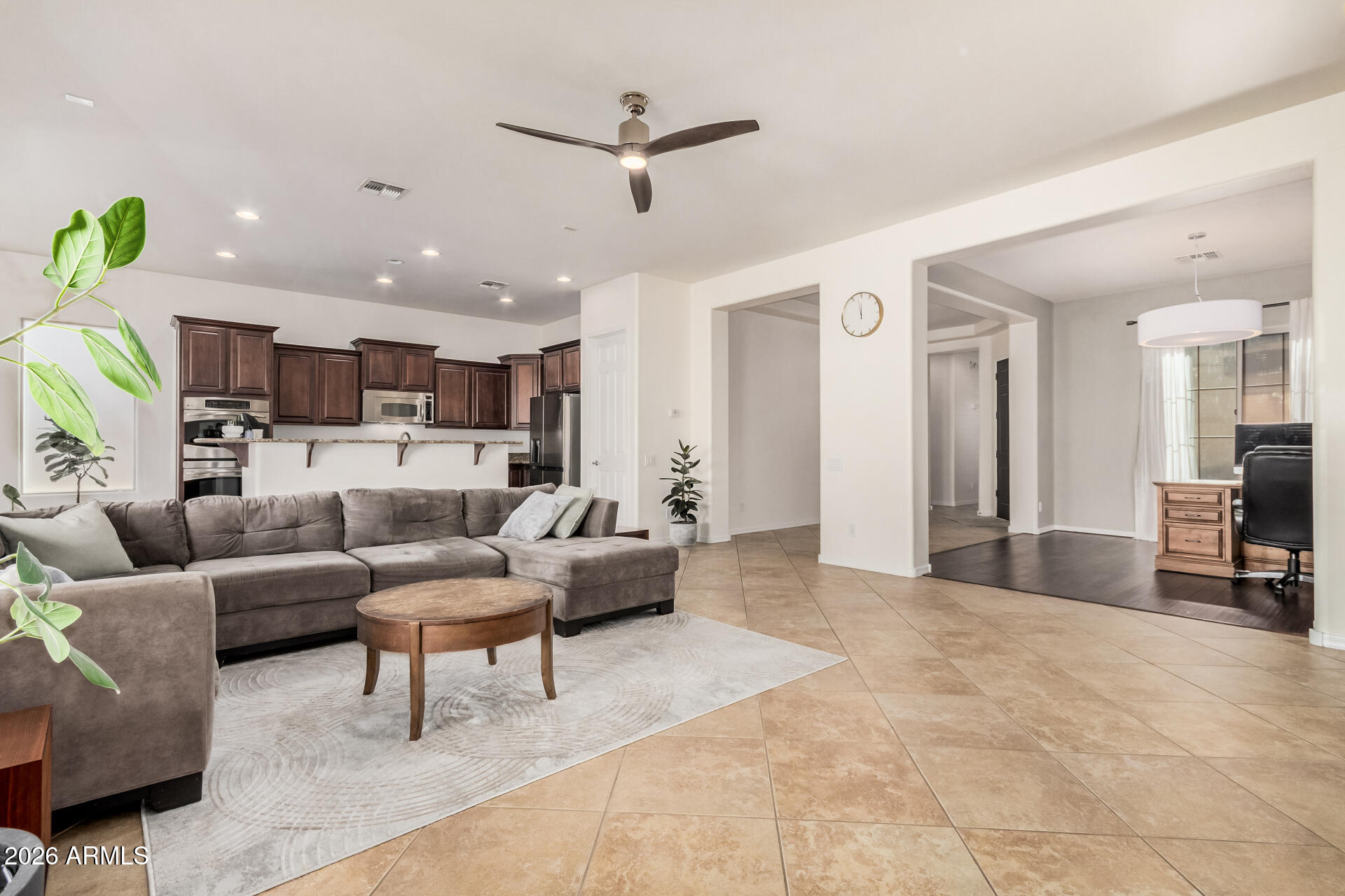 5606 West Desperado Way Phoenix, AZ 85083 - Photo 9 of 43 a living room with furniture and kitchen view