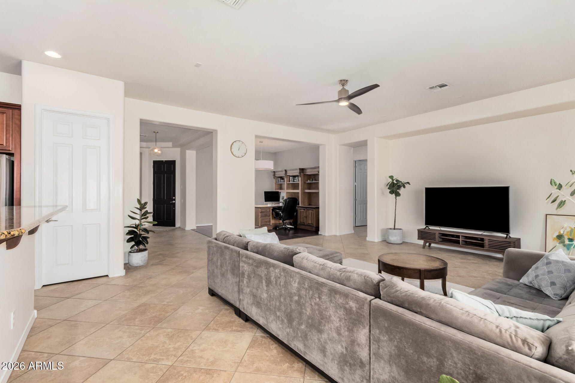 5606 West Desperado Way Phoenix, AZ 85083 - Photo 10 of 43 a living room with furniture and a flat screen tv