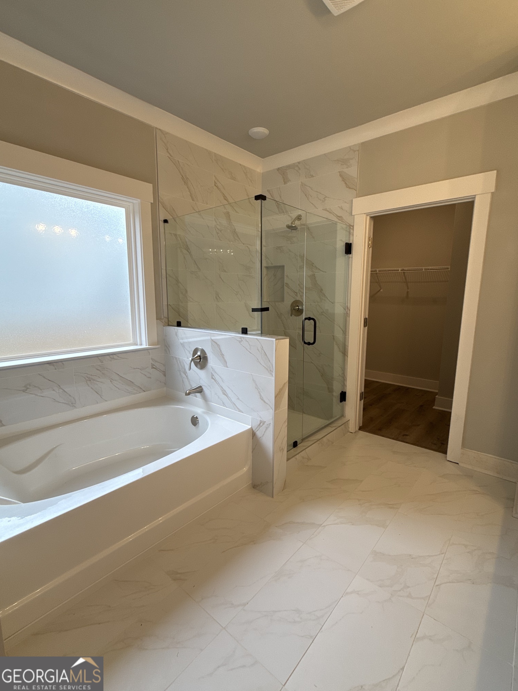 396 Tanners Bridge Road Bethlehem, GA 30620 - Photo 11 of 11 a bathroom with a bathtub and a shower