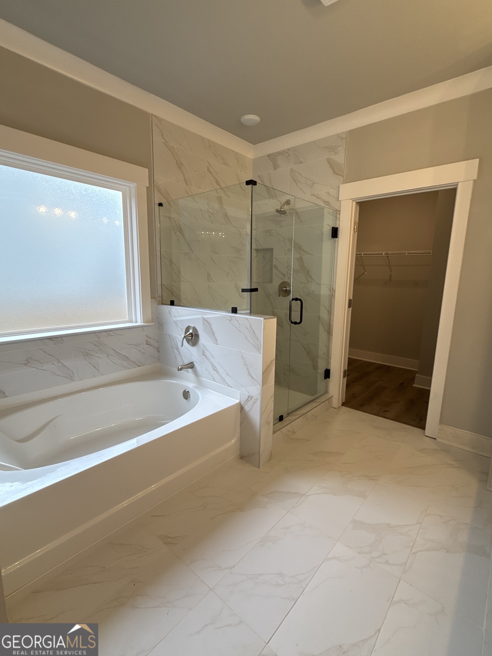396 Tanners Bridge Road Bethlehem, GA 30620 - Photo 7 of 11 a bathroom with a bathtub and a shower