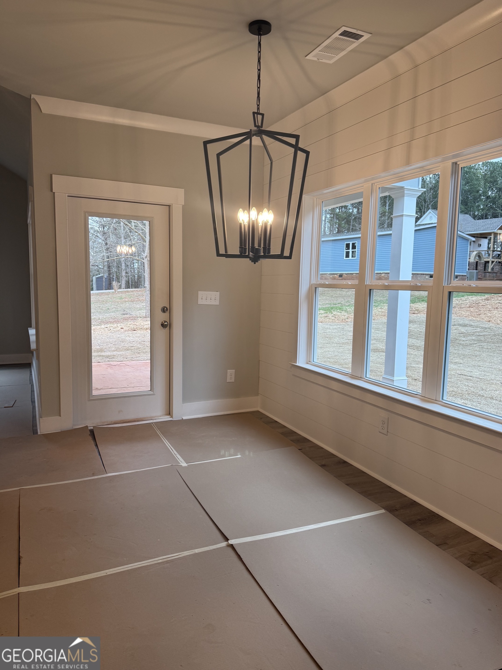 396 Tanners Bridge Road Bethlehem, GA 30620 - Photo 8 of 11 a view of an empty room with a window