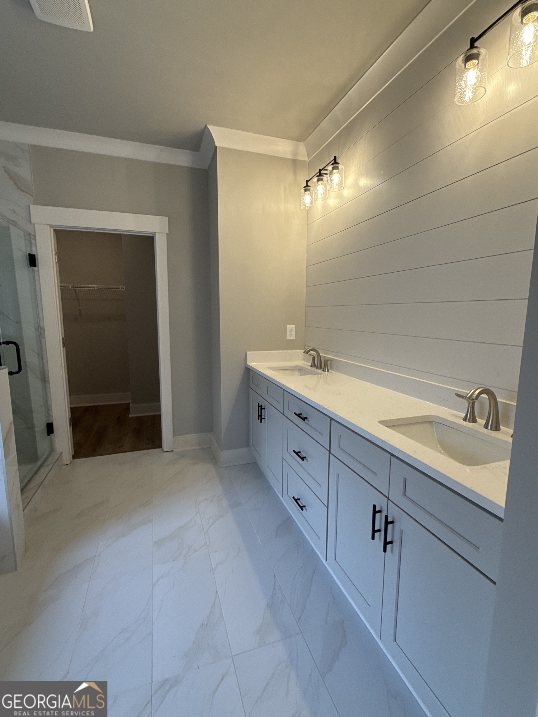 396 Tanners Bridge Road Bethlehem, GA 30620 - Photo 10 of 11 a spacious bathroom with a double vanity sink and a mirror
