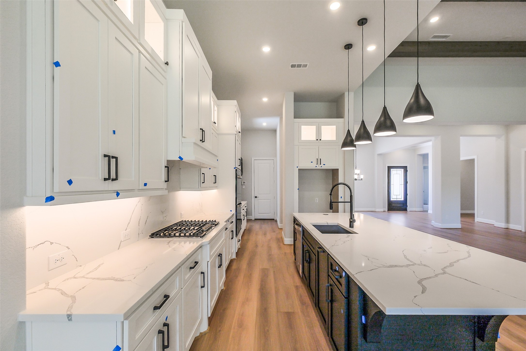 12965 Whitewater Way Conroe, TX 77302 - Photo 12 of 50 a large kitchen with stainless steel appliances kitchen island a large stove a sink dishwasher with a dining table and chairs