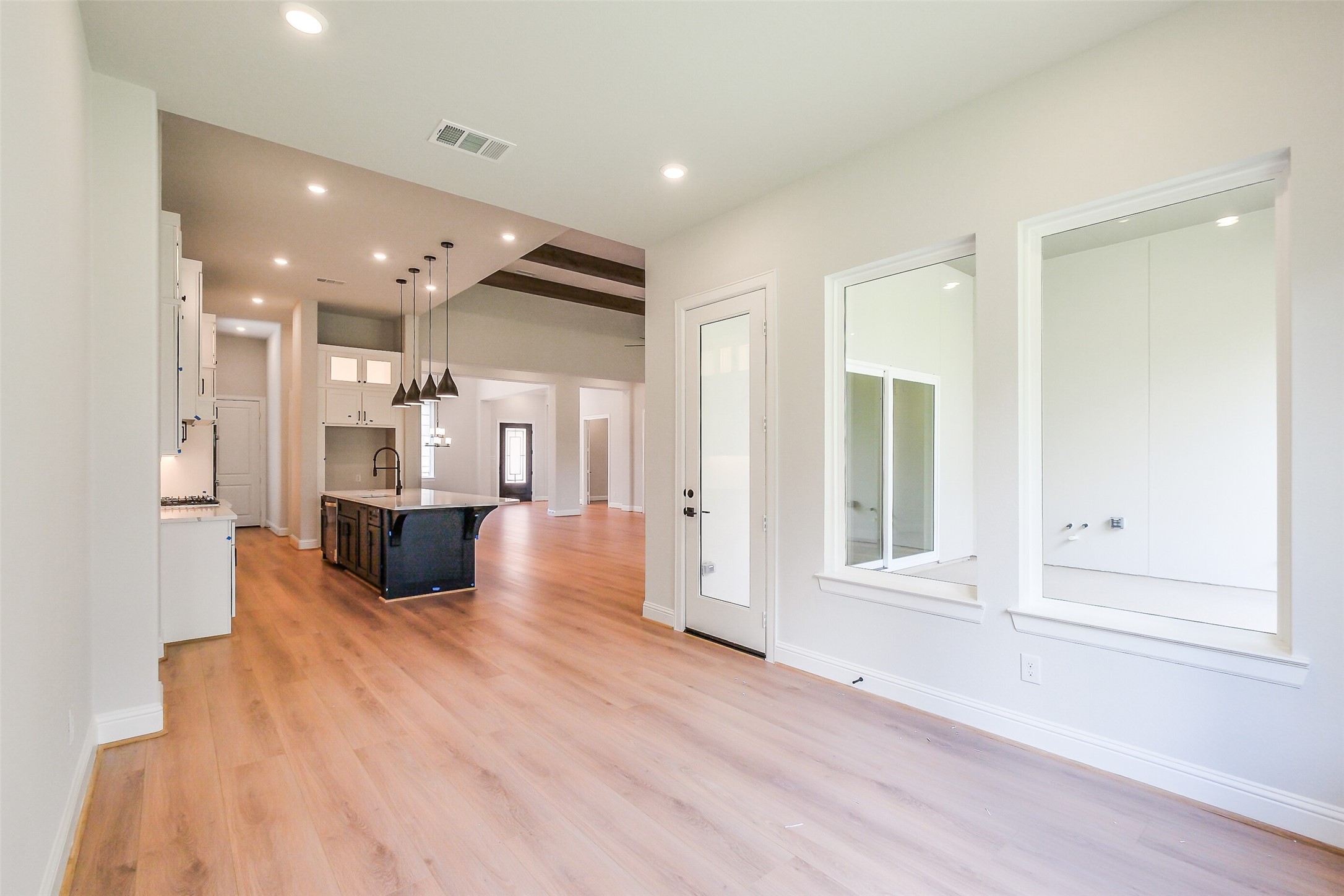 12965 Whitewater Way Conroe, TX 77302 - Photo 20 of 50 a view of kitchen with furniture and refrigerator