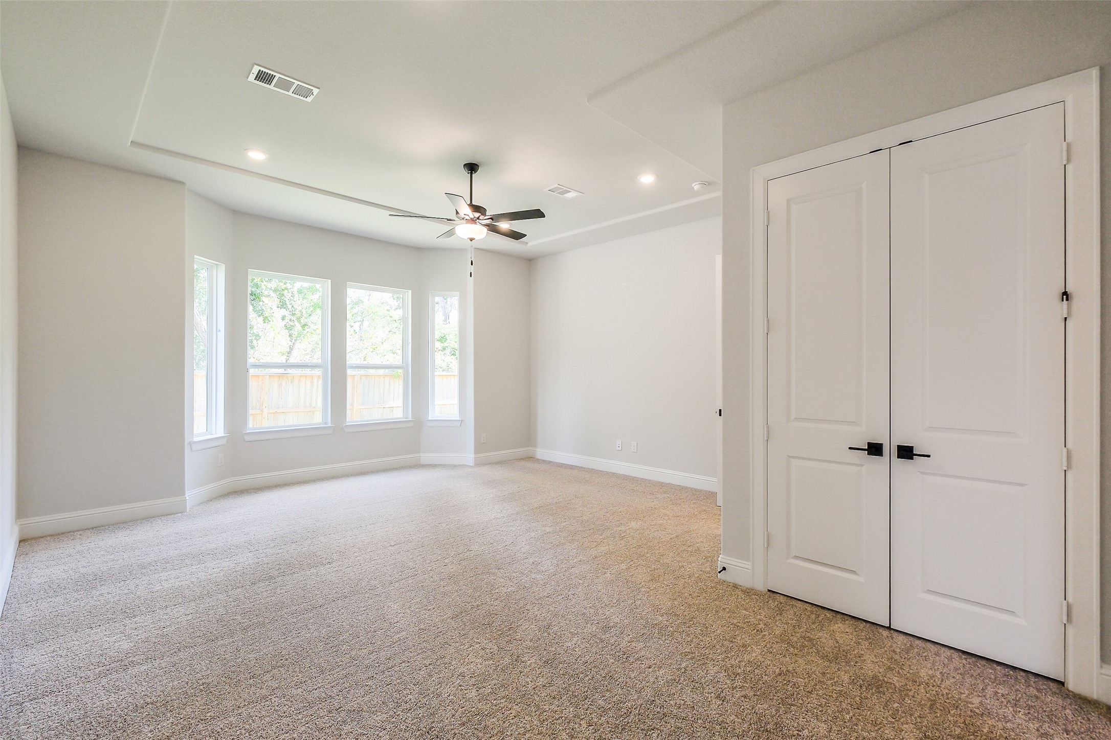 12965 Whitewater Way Conroe, TX 77302 - Photo 25 of 50 a view of an empty room with a window