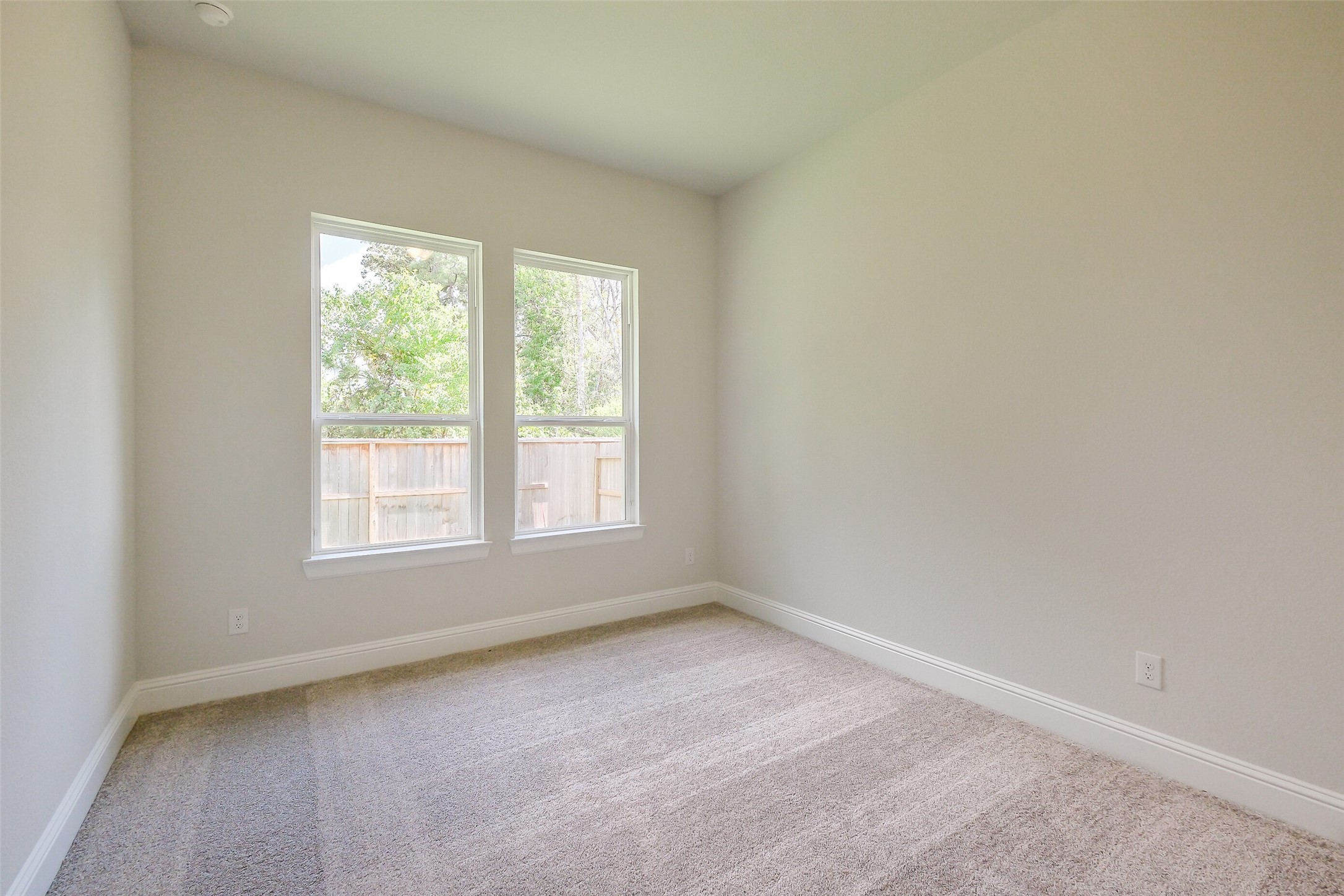 12965 Whitewater Way Conroe, TX 77302 - Photo 33 of 50 an empty room with a window
