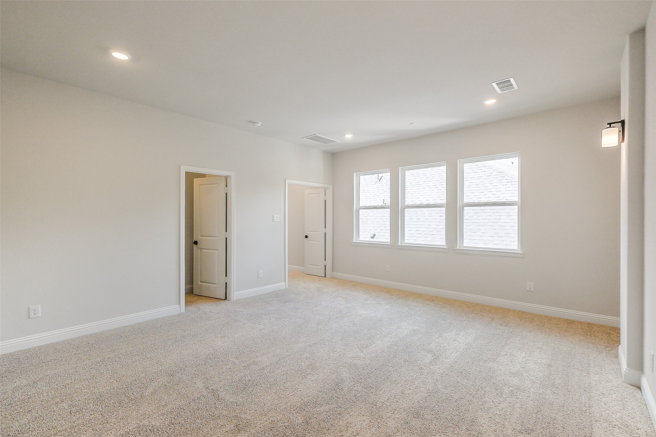 12965 Whitewater Way Conroe, TX 77302 - Photo 38 of 50 a view of an empty room with a window