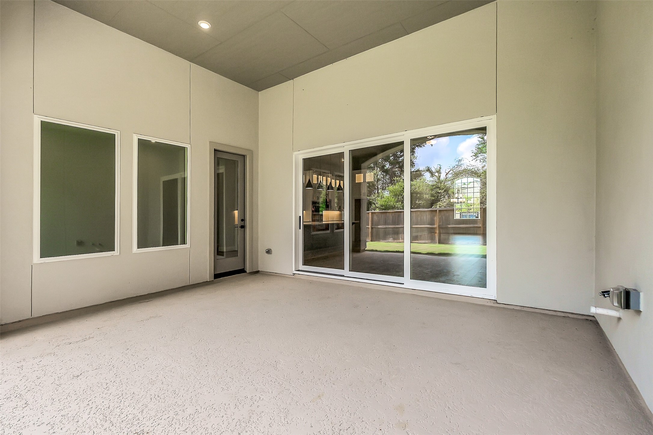 12965 Whitewater Way Conroe, TX 77302 - Photo 46 of 50 a view of an empty room with a sliding door