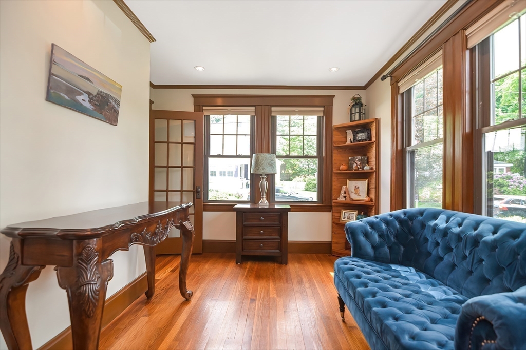 15 Evans Road Needham, MA 02492 - Photo 15 of 30 a living room with furniture and a large window