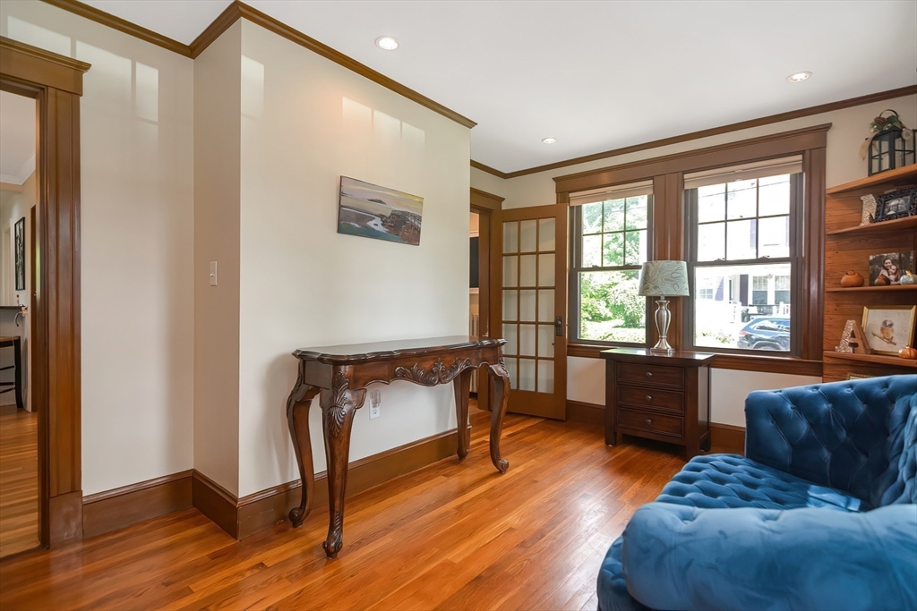 15 Evans Road Needham, MA 02492 - Photo 16 of 30 a living room with furniture and a window