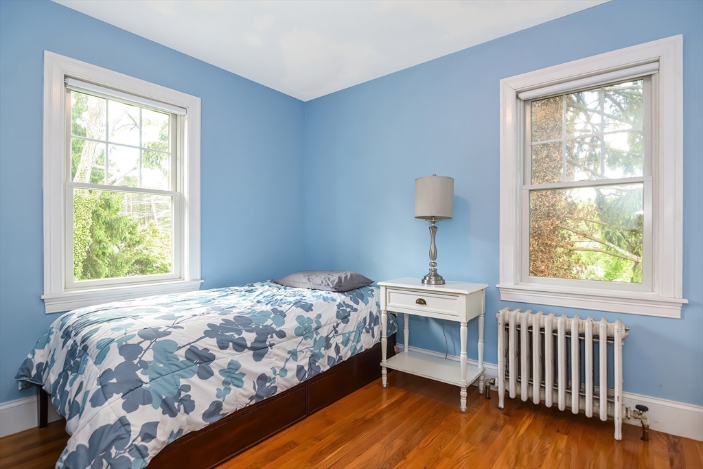 15 Evans Road Needham, MA 02492 - Photo 21 of 30 a bedroom with a bed and a window