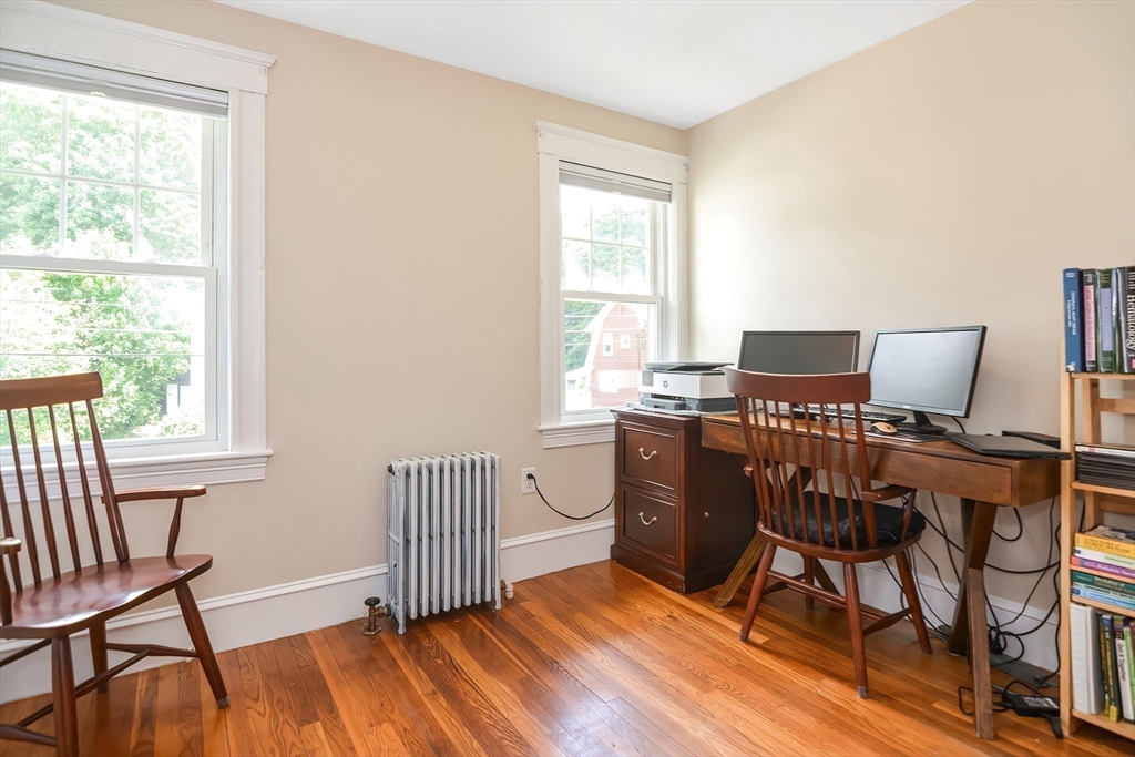 15 Evans Road Needham, MA 02492 - Photo 26 of 30 a view of a workspace with furniture and a window