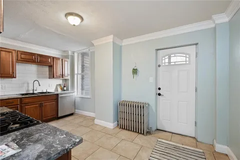 a room with a bed and a window