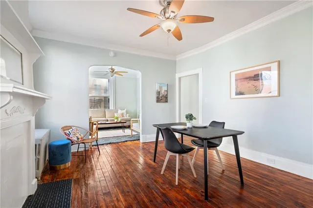 a view of a livingroom with furniture and a table