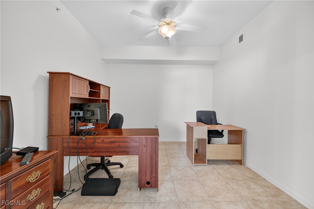 8251 Pathfinder Loop, Unit 621 Fort Myers, FL 33919 - Photo 14 of 32 a workspace with furniture and window