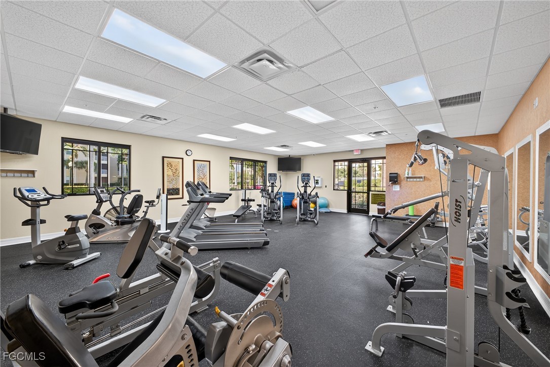 8251 Pathfinder Loop, Unit 621 Fort Myers, FL 33919 - Photo 29 of 32 a view of a room with gym equipment