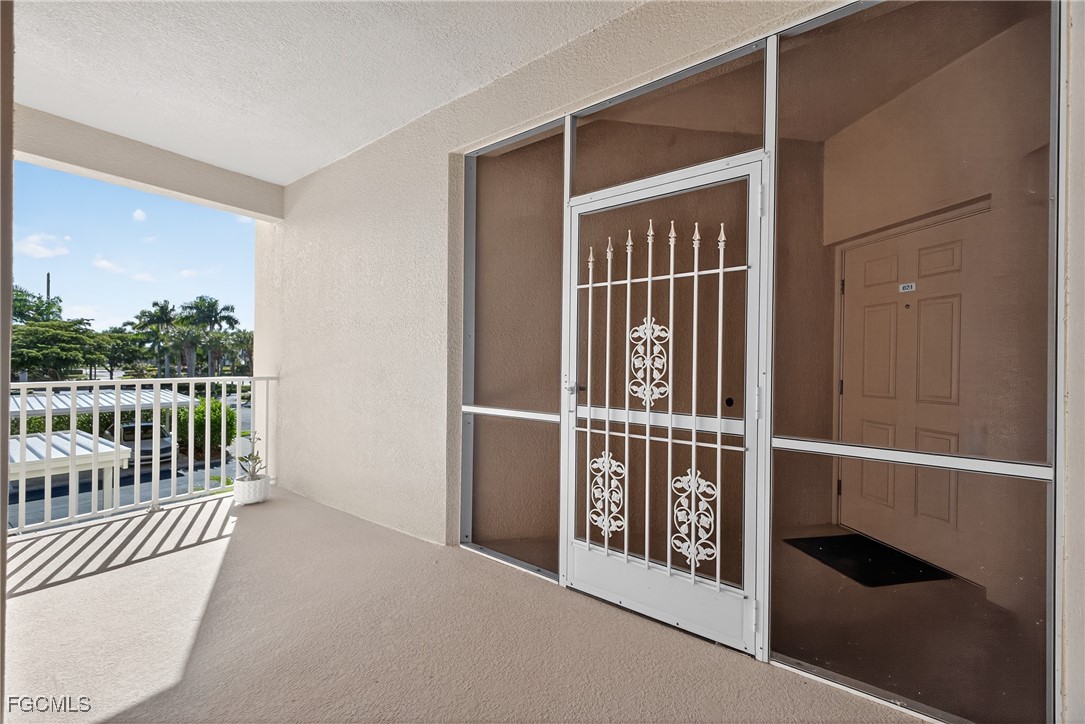 8251 Pathfinder Loop, Unit 621 Fort Myers, FL 33919 - Photo 4 of 32 a view of balcony