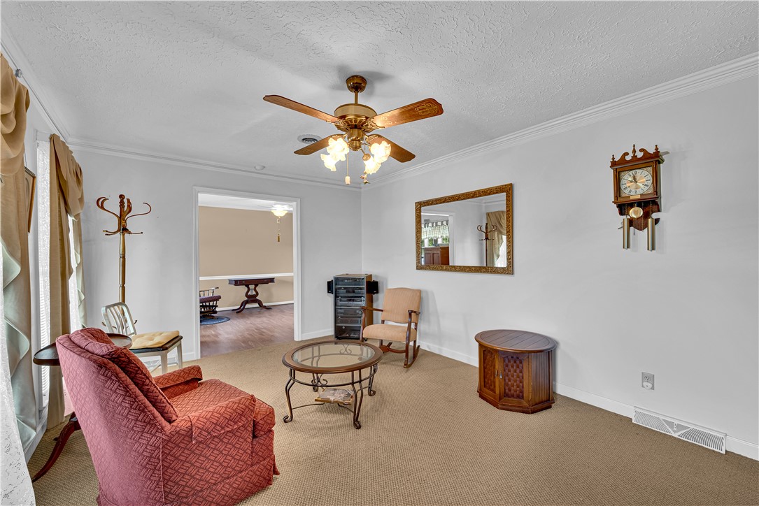 307 Calhoun Road Belton, SC 29627 - Photo 16 of 30 A well-appointed living room offers ample space for comfortable gatherings.
