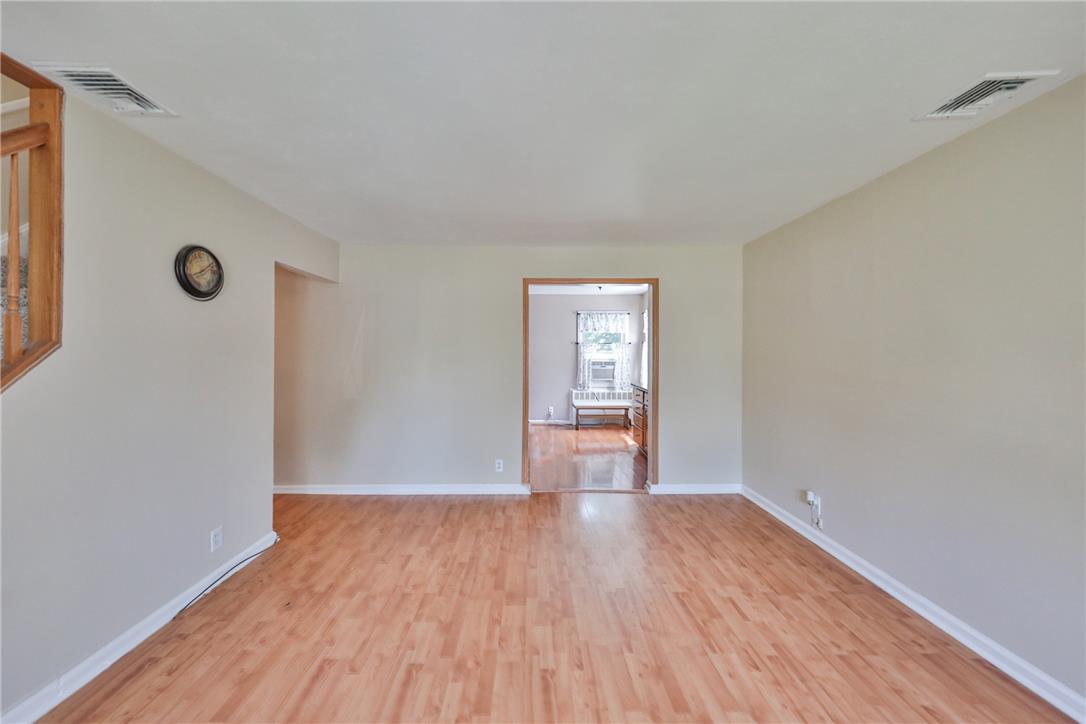 3050 Cornwall Road Bethlehem, PA 18017 - Photo 10 of 80 Bright hardwood floors create a warm, inviting atmosphere for gatherings or quiet evenings.