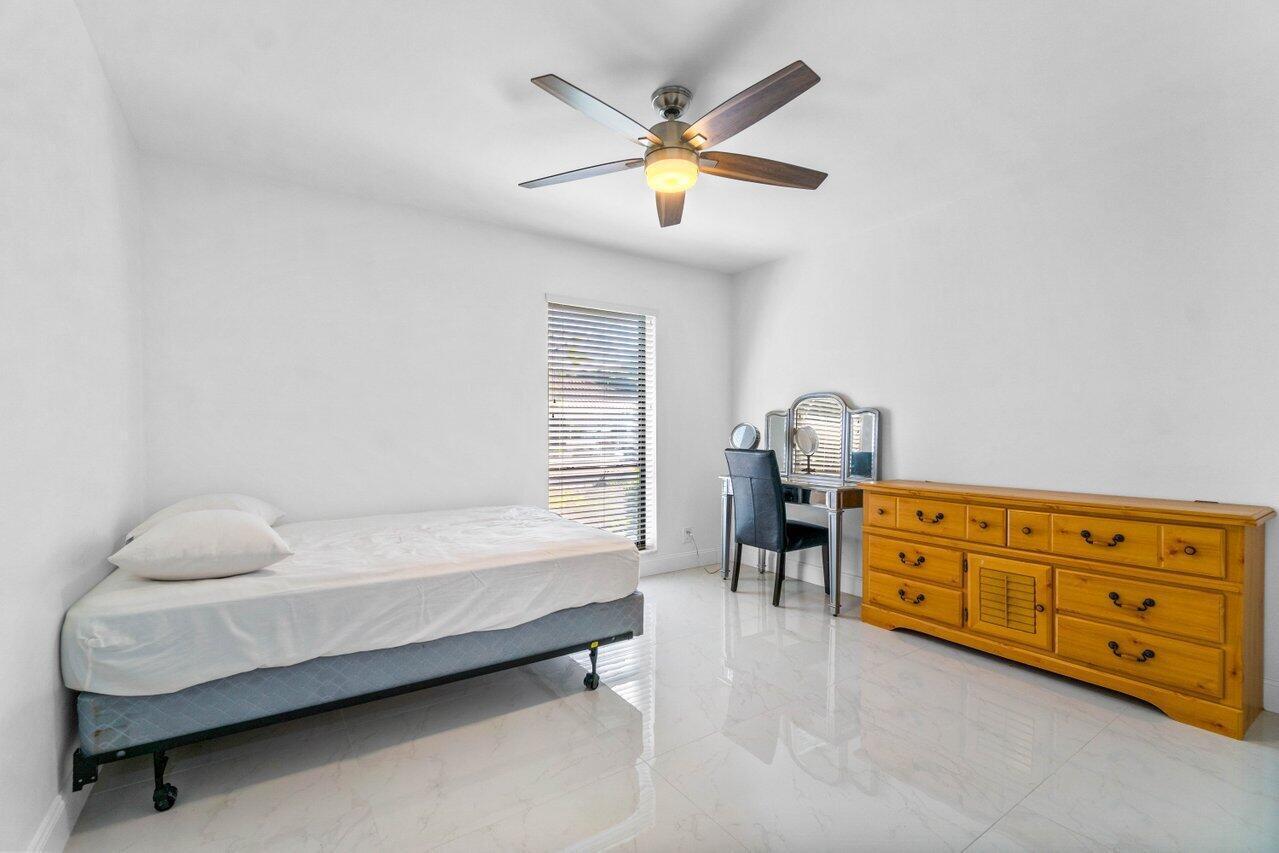 2683 Northwest 45th Street Boca Raton, FL 33434 - Photo 19 of 28 Second Bedroom