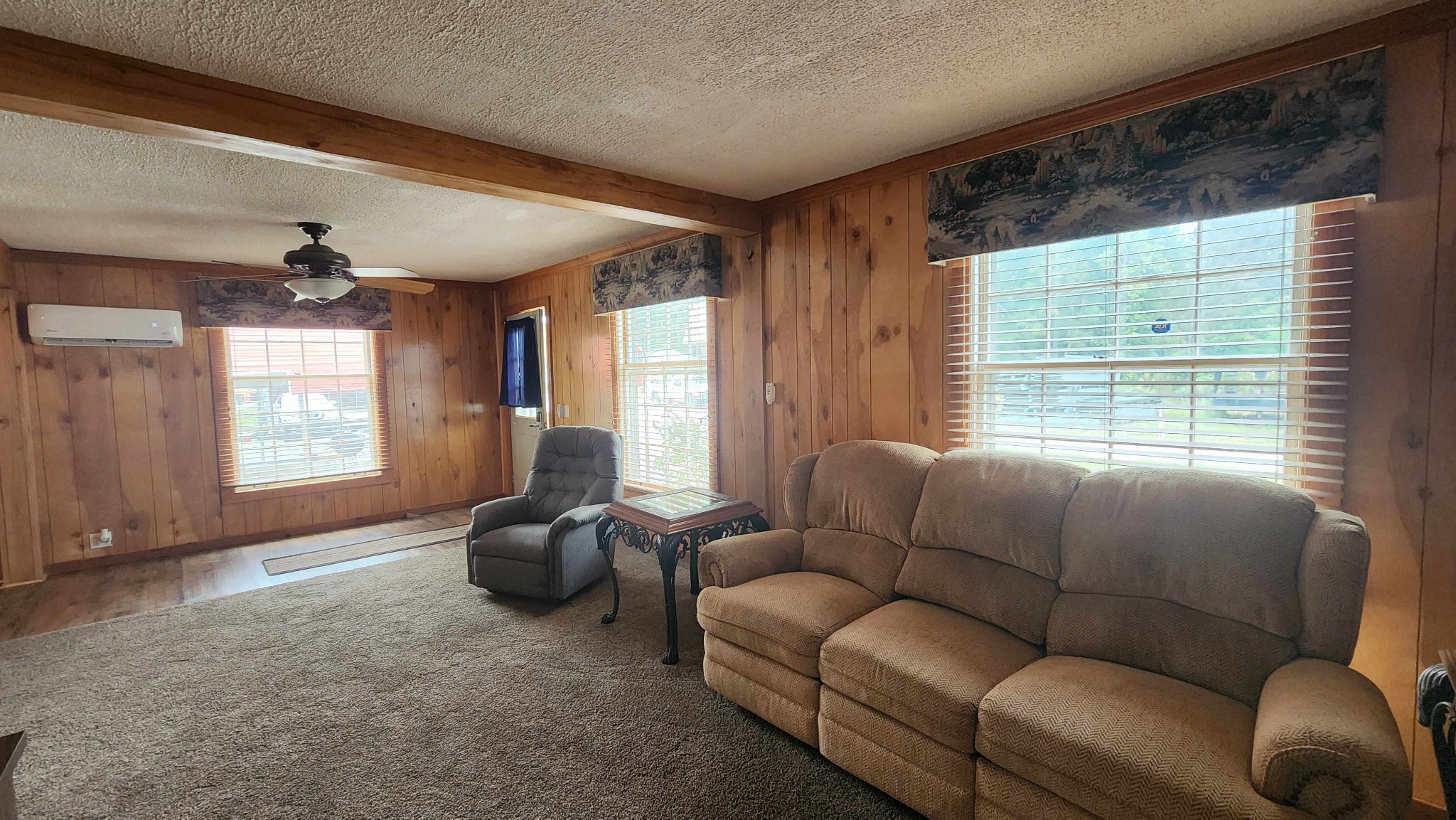348 Bill Hunter Road Celina, TN 38551 - Photo 22 of 50 a living room with furniture and a large window