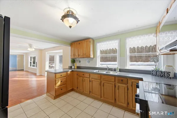 a kitchen with a sink and cabinets