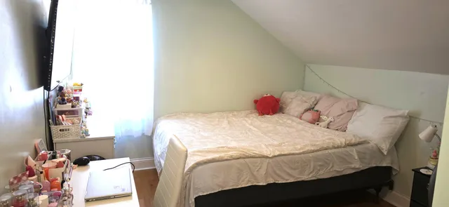 a bathroom with a bathtub sink and shower