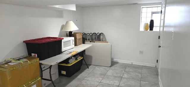 a bathroom with a shower and toilet