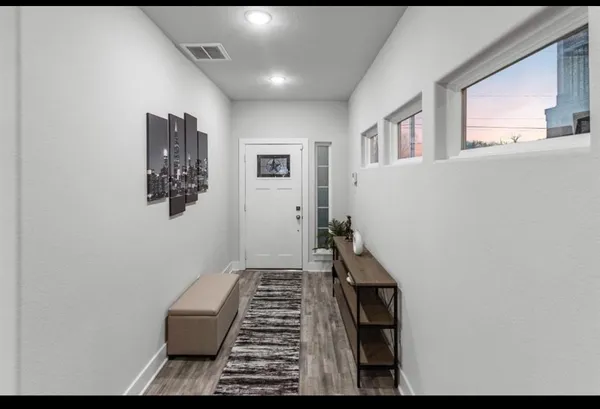 a view of an empty room and window