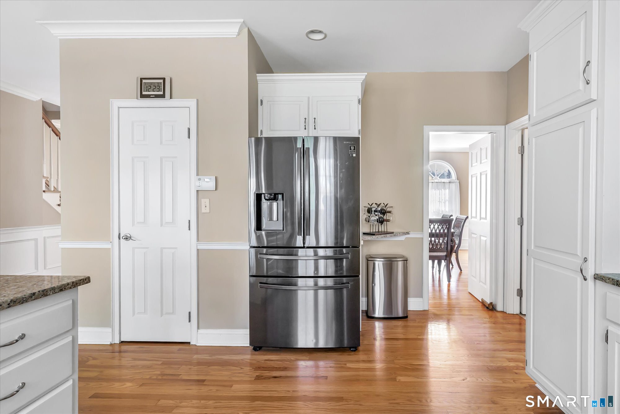 111 Stones Throw Trumbull, CT 06611 - Photo 16 of 47 a kitchen with stainless steel appliances a refrigerator and wooden floor