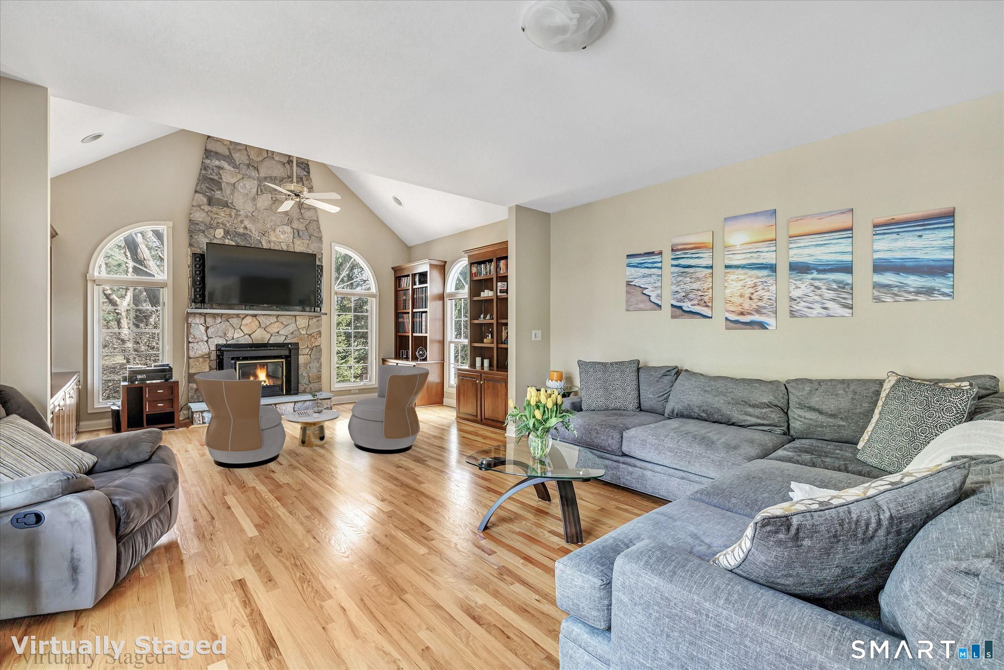 111 Stones Throw Trumbull, CT 06611 - Photo 20 of 47 a living room with fireplace furniture and a flat screen tv