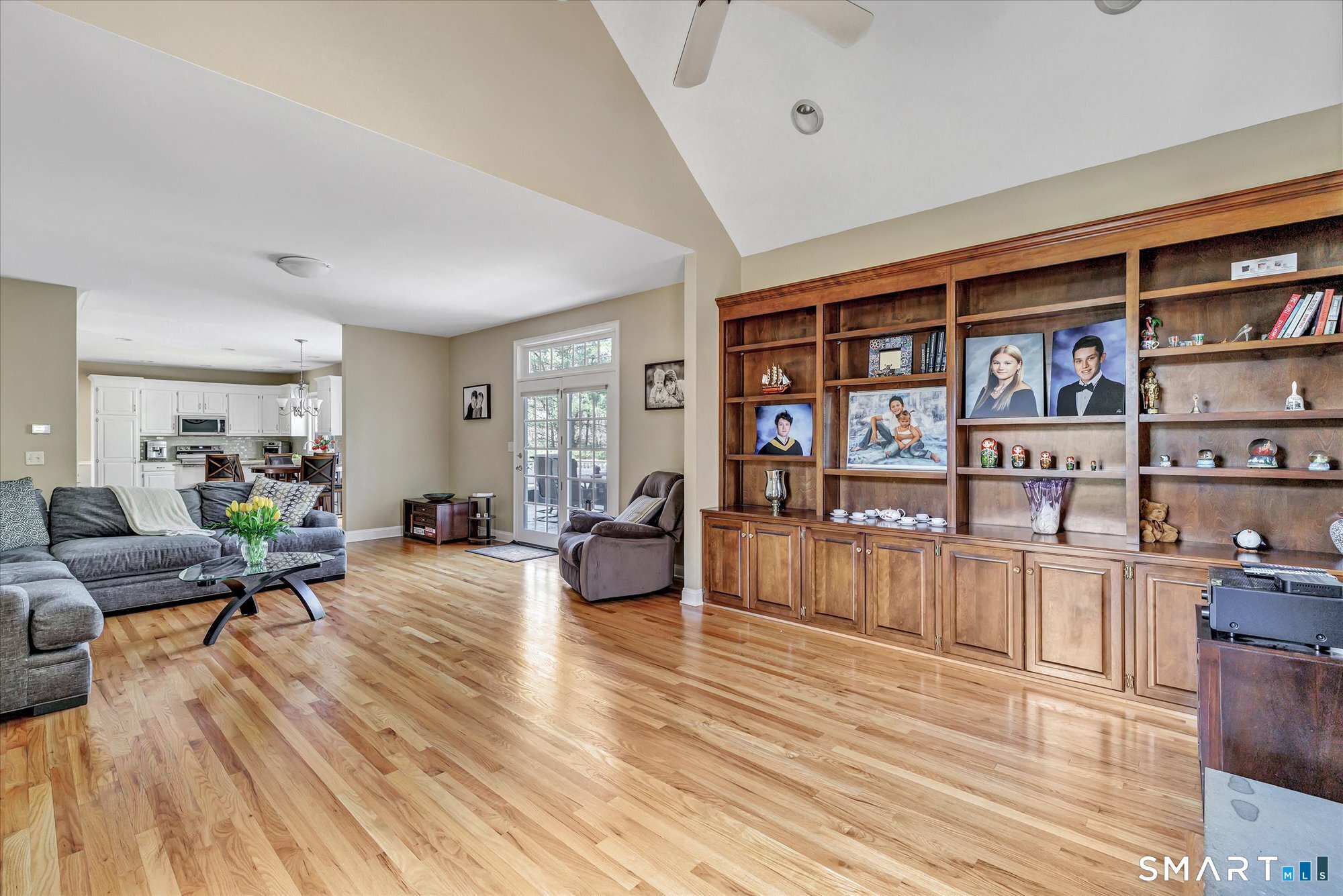 111 Stones Throw Trumbull, CT 06611 - Photo 23 of 47 a living room with furniture and a book shelf