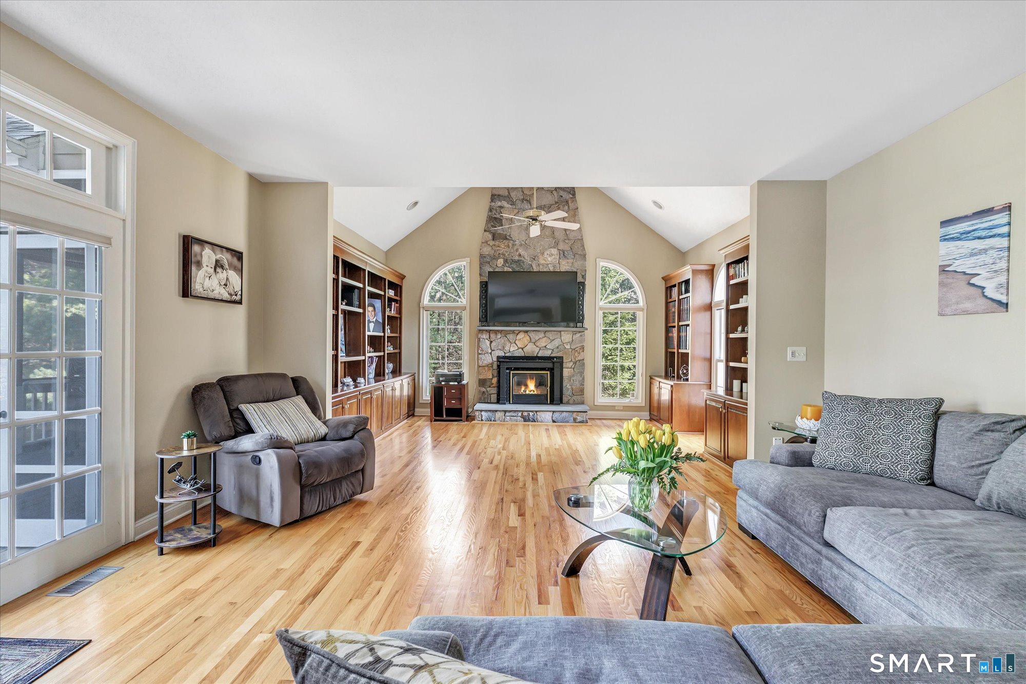 111 Stones Throw Trumbull, CT 06611 - Photo 24 of 47 a living room with furniture and a fireplace