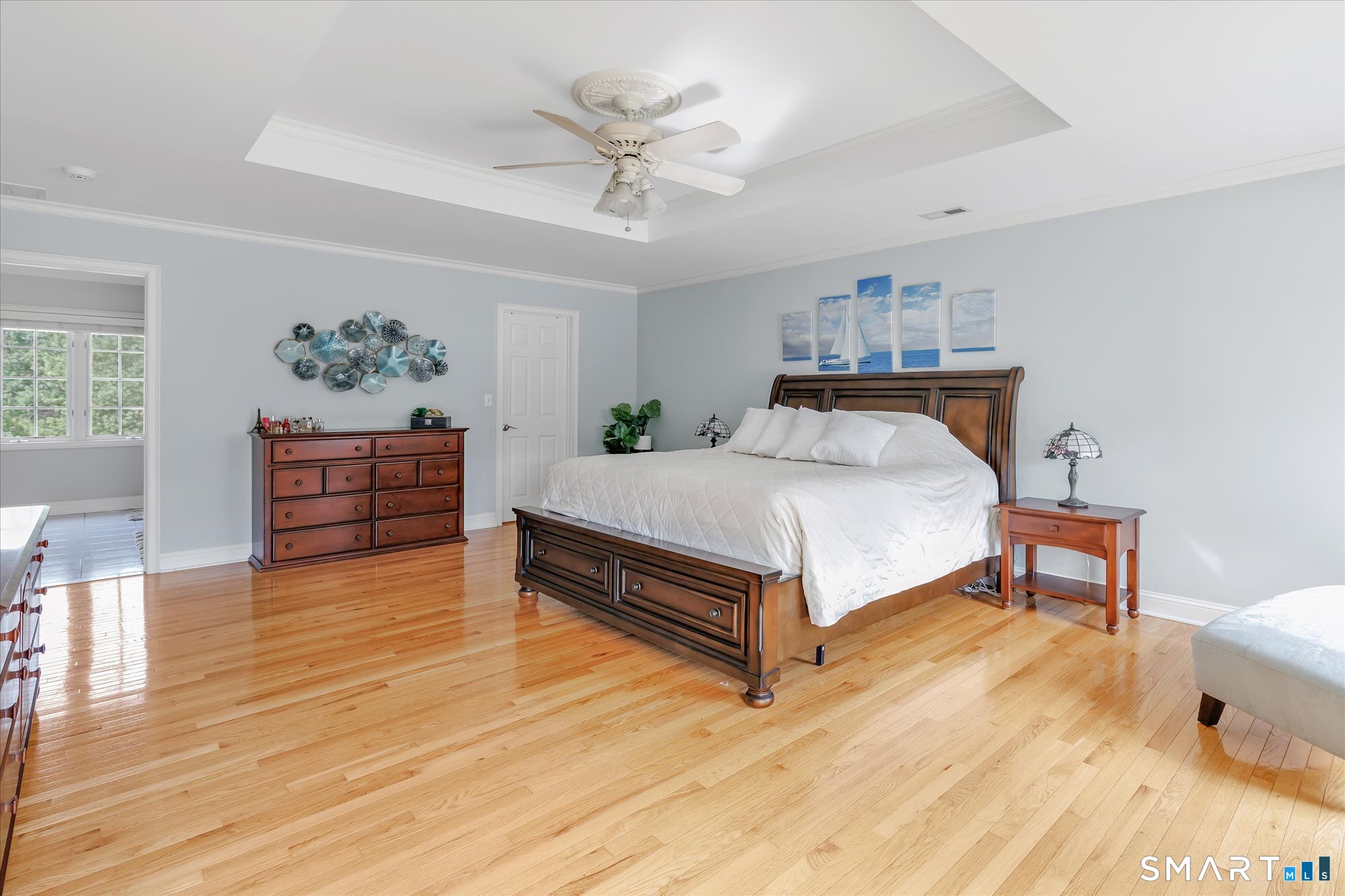 111 Stones Throw Trumbull, CT 06611 - Photo 32 of 47 a bedroom with a bed and a table in it