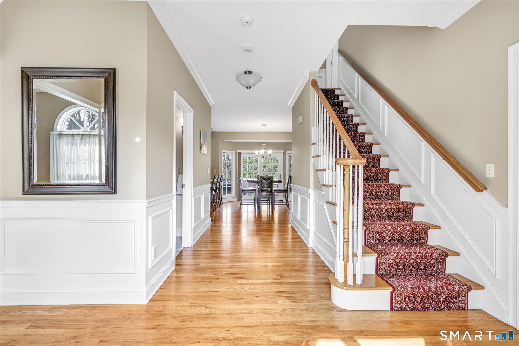 111 Stones Throw Trumbull, CT 06611 - Photo 9 of 47 a view of entryway and hall with wooden floor