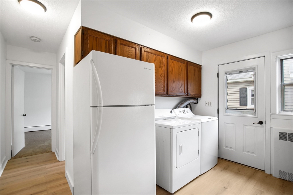 45 Horseshoe Drive, Unit 45 Chicopee, MA 01022 - Photo 12 of 31 a utility room with dryer and washer