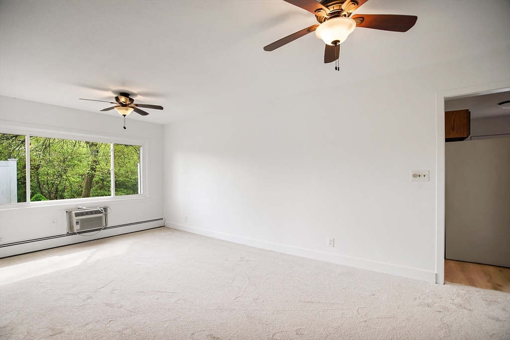 45 Horseshoe Drive, Unit 45 Chicopee, MA 01022 - Photo 19 of 31 an empty room with a window