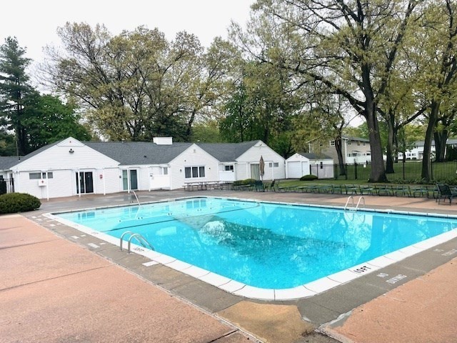 45 Horseshoe Drive, Unit 45 Chicopee, MA 01022 - Photo 29 of 31 a view of swimming pool and lounge chair