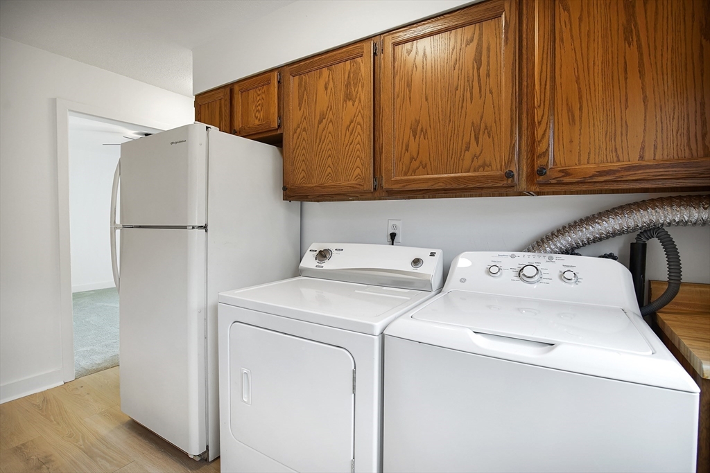 45 Horseshoe Drive, Unit 45 Chicopee, MA 01022 - Photo 3 of 31 a utility room with dryer and washer